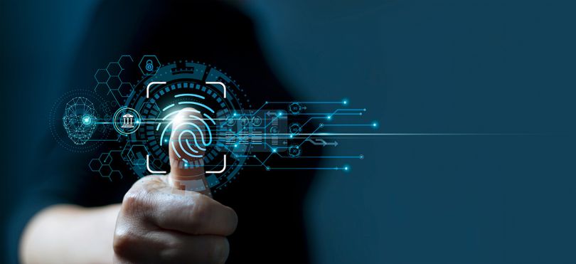 Businessman using fingerprint indentification to access personal financial data