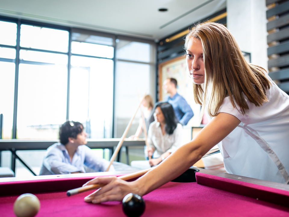 ServiceNow's Ellen Ormerod shooting pool