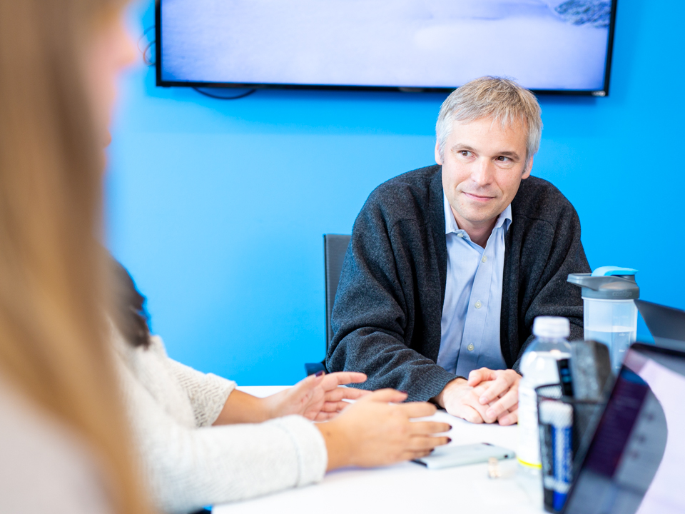 Andy Pruitt talks with employees 