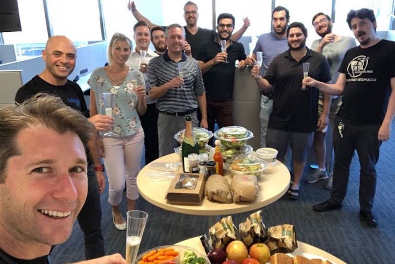 Bringg staff celebrating during office party