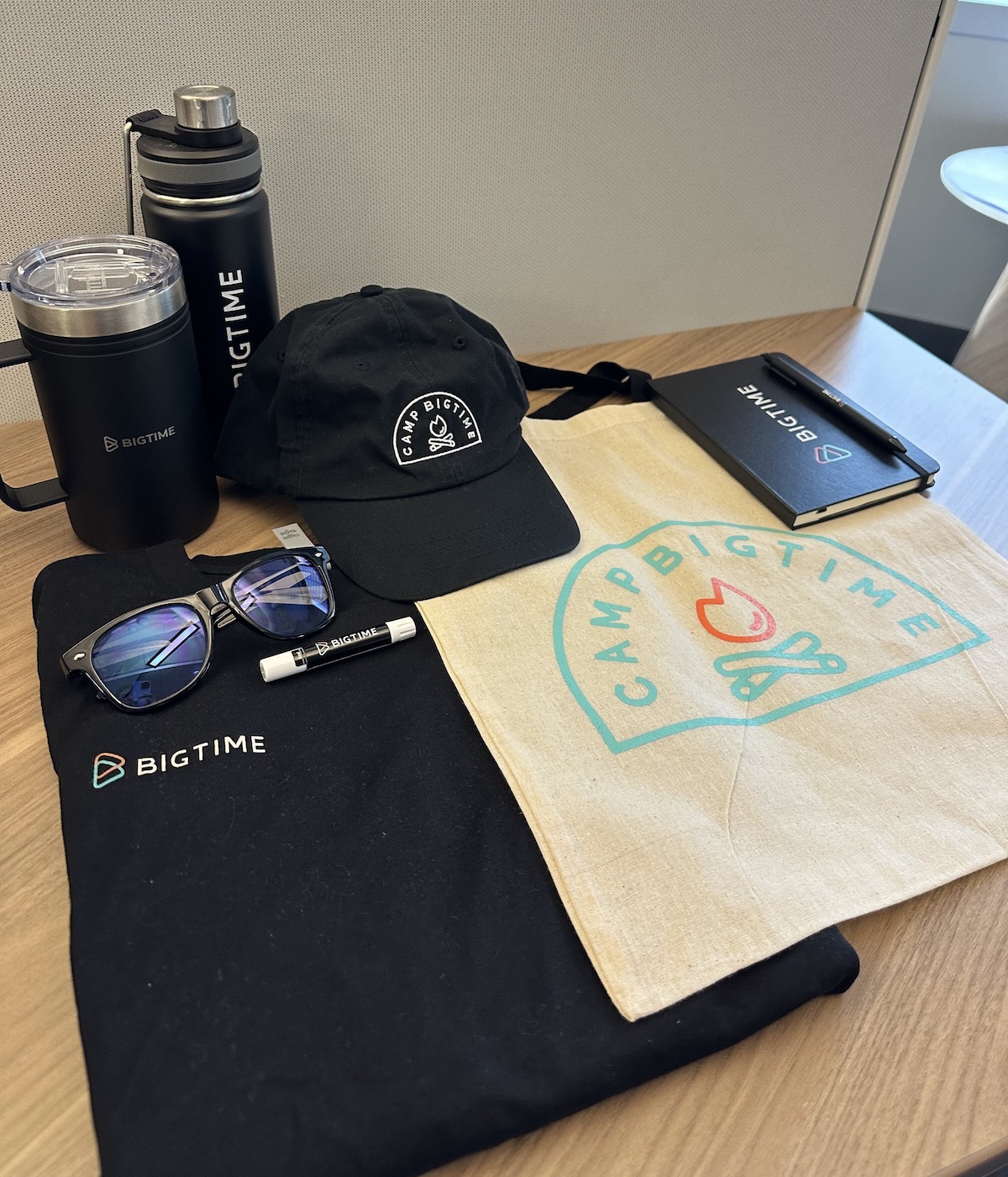 BigTime's Camp BigTime swag includes a t-shirt, water bottle and canvas bag