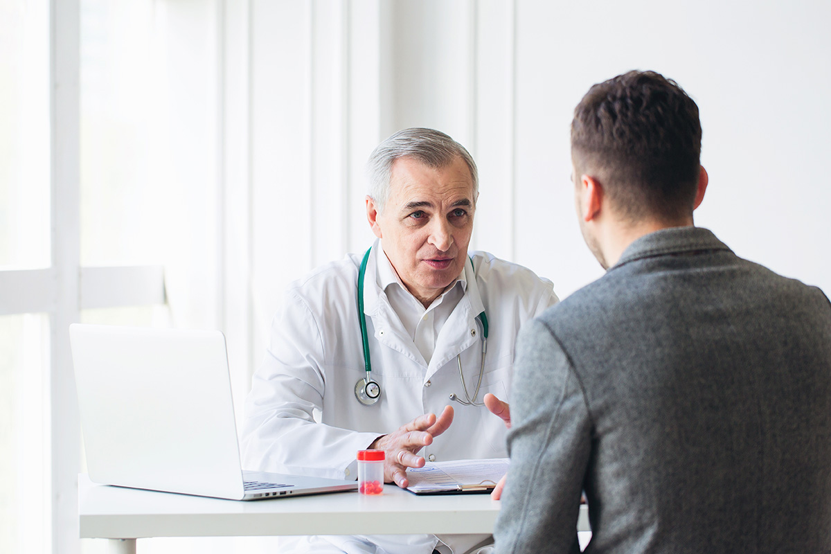 A doctor consulting a patient