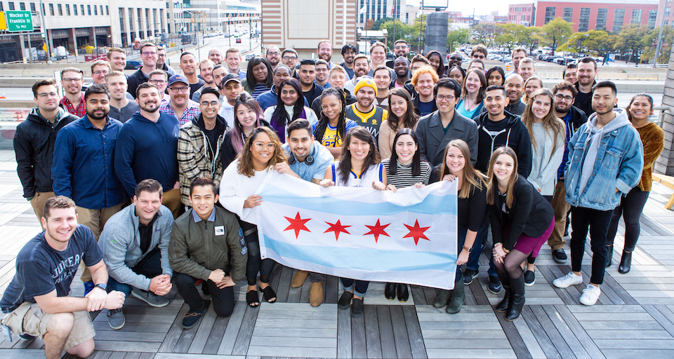 Cisco Meraki team posing with Chicago flag