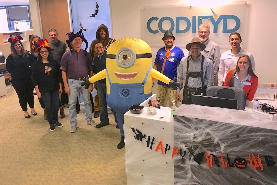 Codifyd staff posing during Halloween party