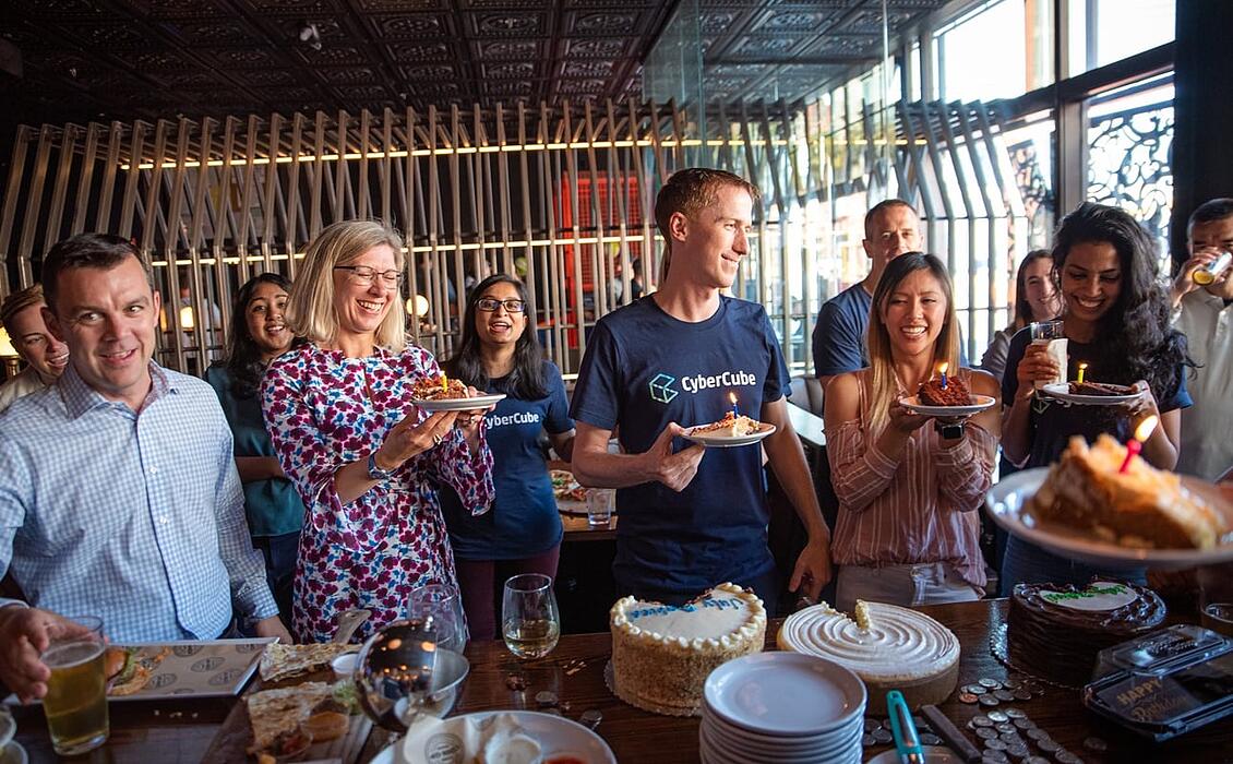 CyberCube team members celebrating a birthday