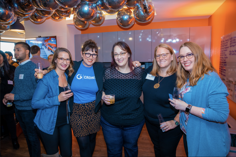 G2 Crowd team members at a party