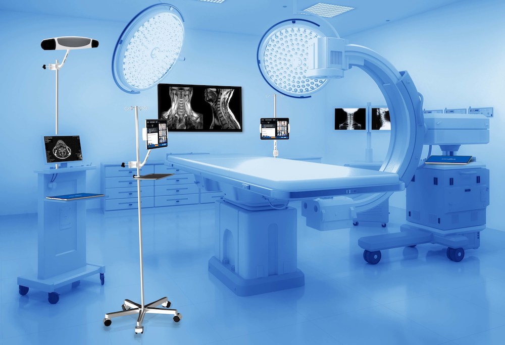 Operating room with Explorer Surgical software on screens.