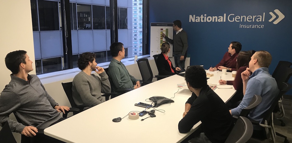 National General team working in conference room