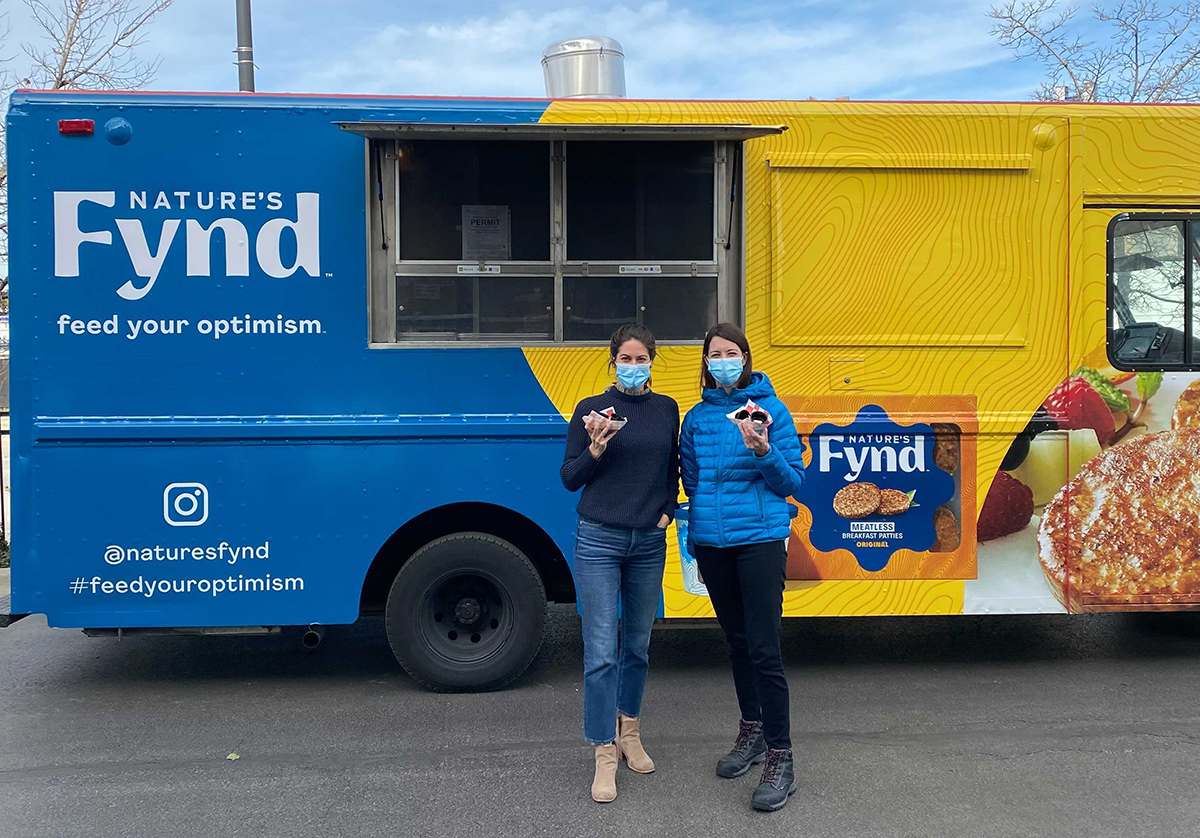 Nature's Fynd team members with a Nature's Fynd food truck