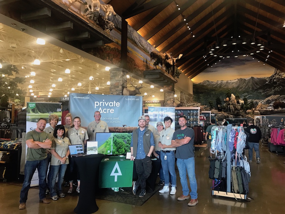 Private Acre staff working in an outdoor equipment store