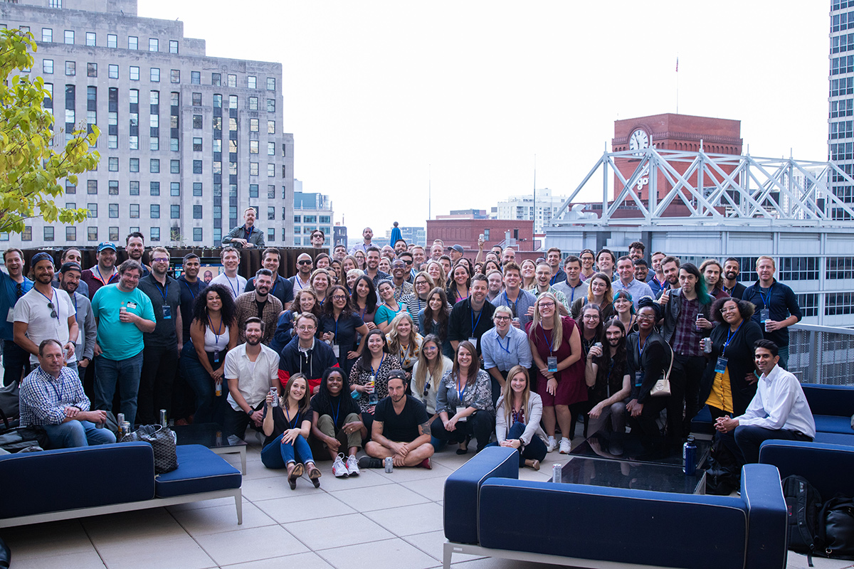 Provi team photo outside on a rooftop patio