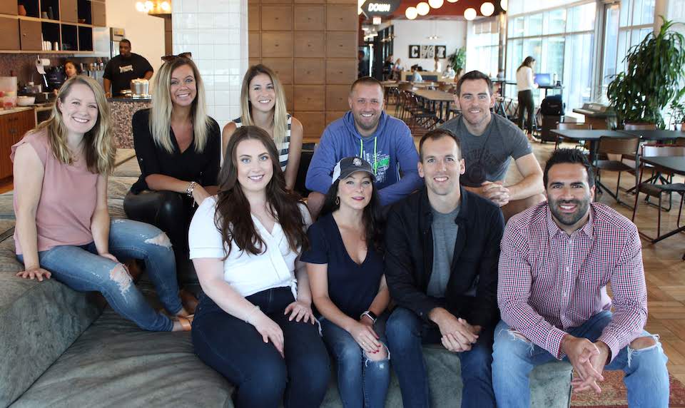 SNACKNATION's sales team in group photo