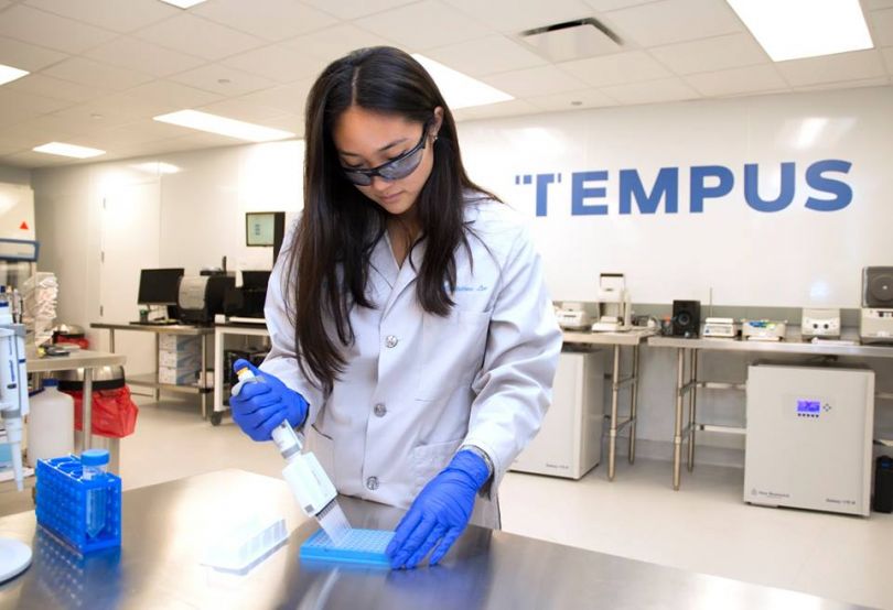 Female lab technician working in Tempus Labs
