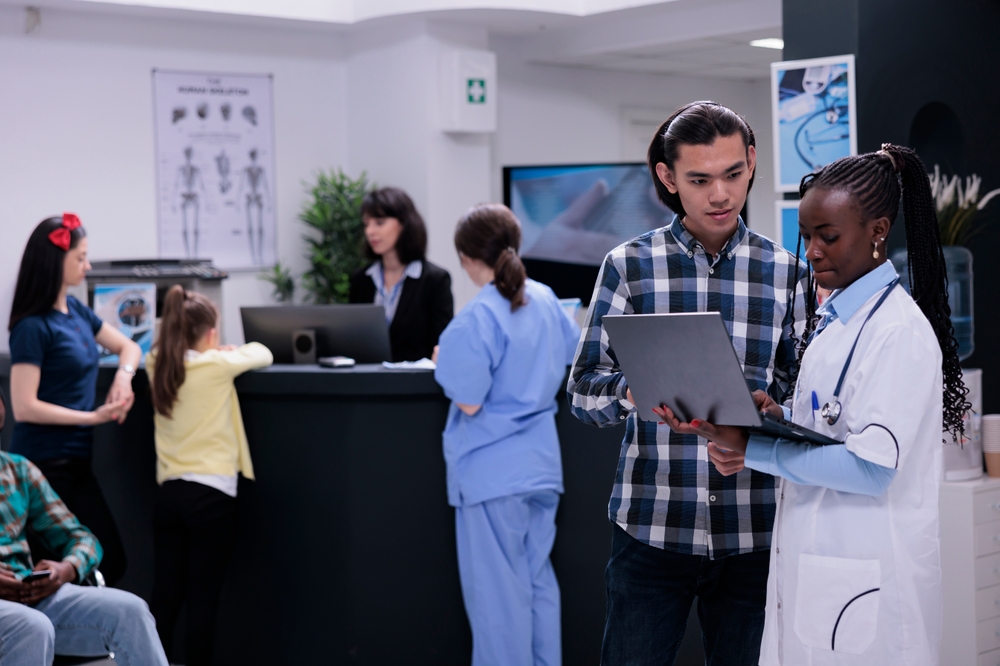 doctor using computer in healthcare setting