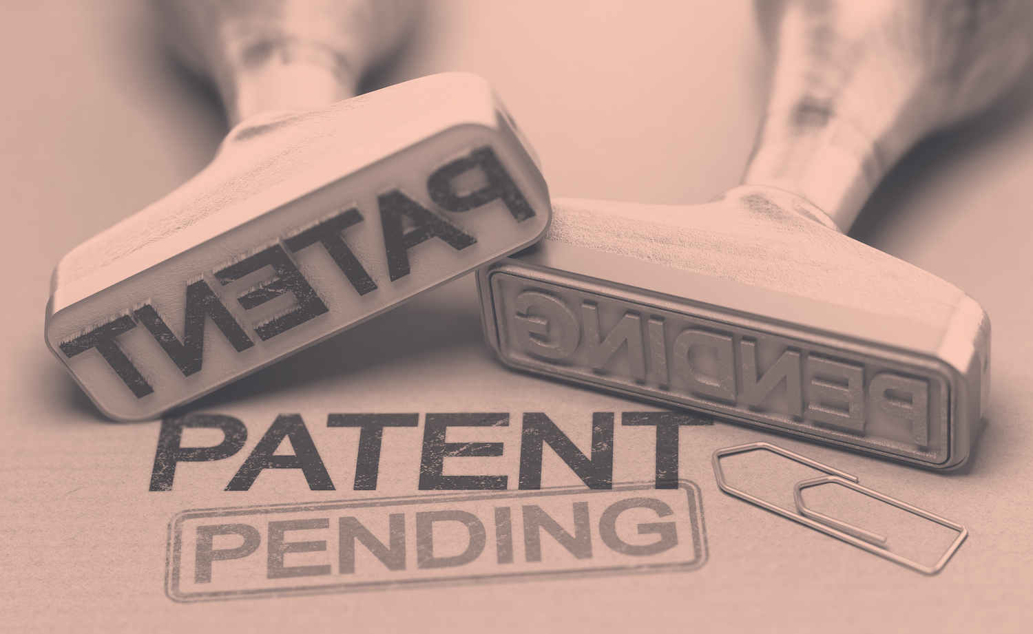 Two stamps spelling out "patent pending."
