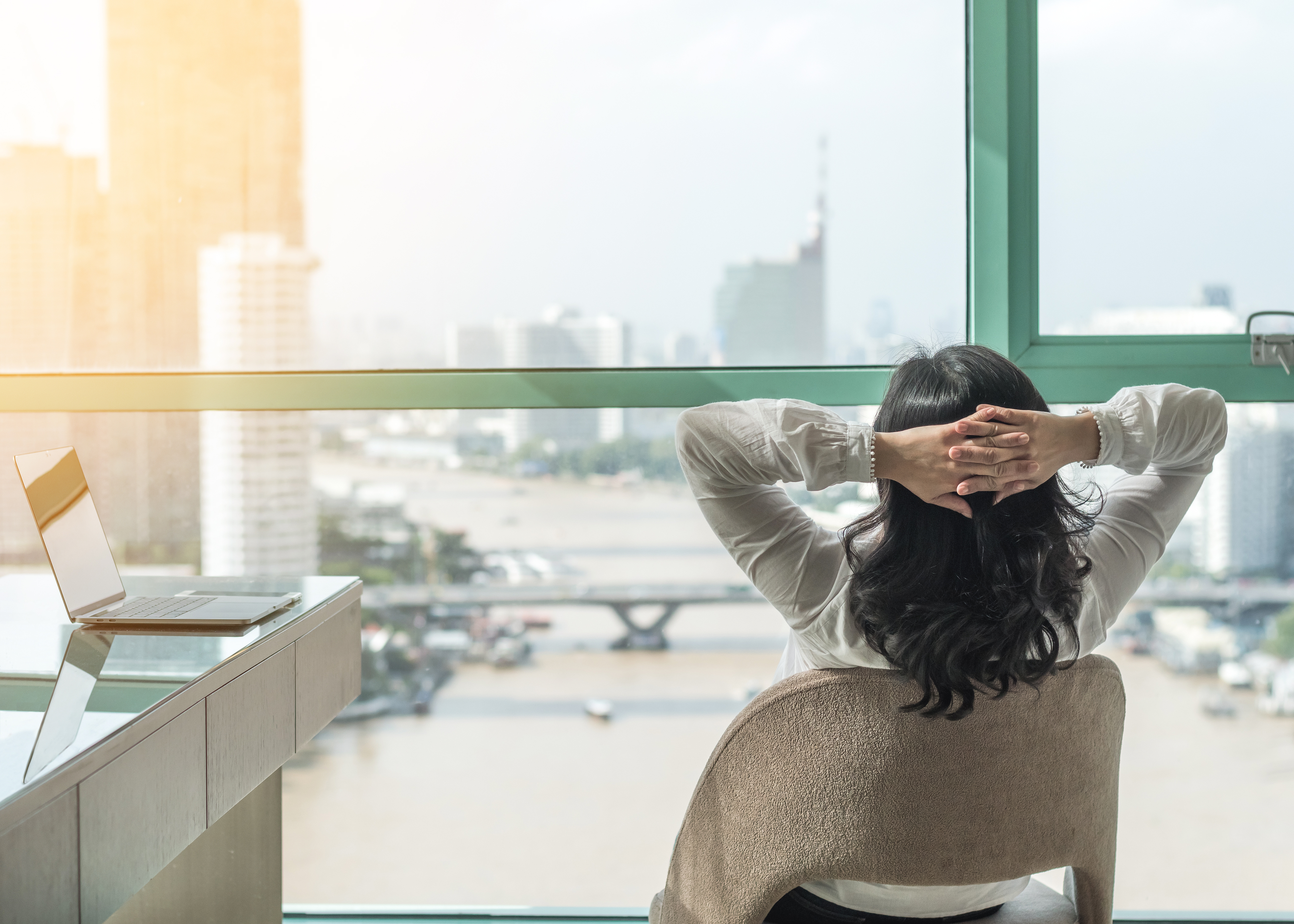 An employee reclines at work.