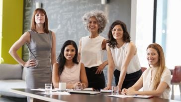Photo of women bosses together in an office.