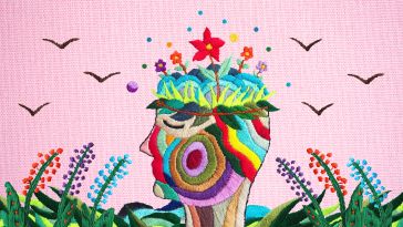 Textile art depicting flowers growing from someone's mind.