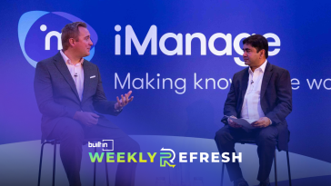 Howard Lewis (left), Microsoft's head of professional and business services, sits on stage with iManage CEO Neil Araujo (right).