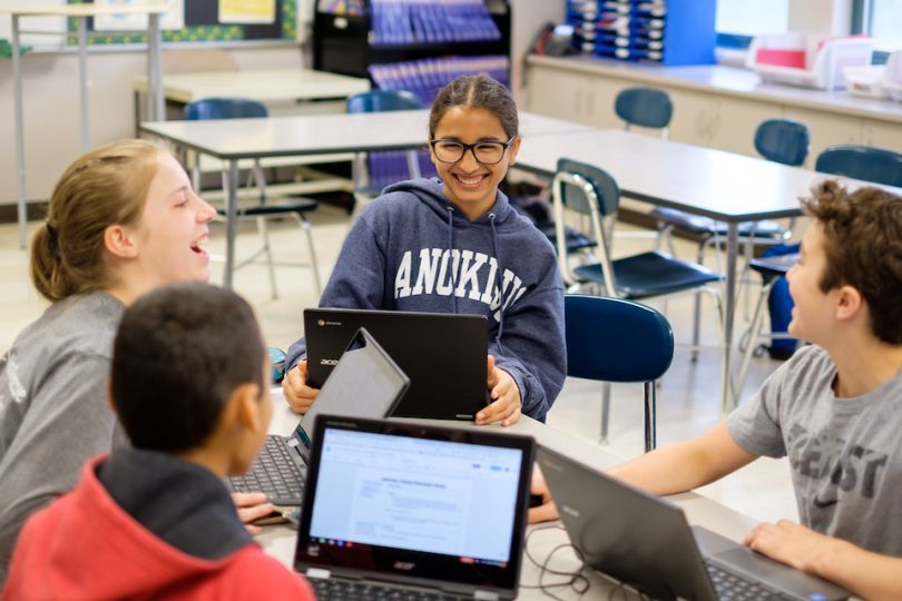 Leap Innovations — children laughing in a classroom